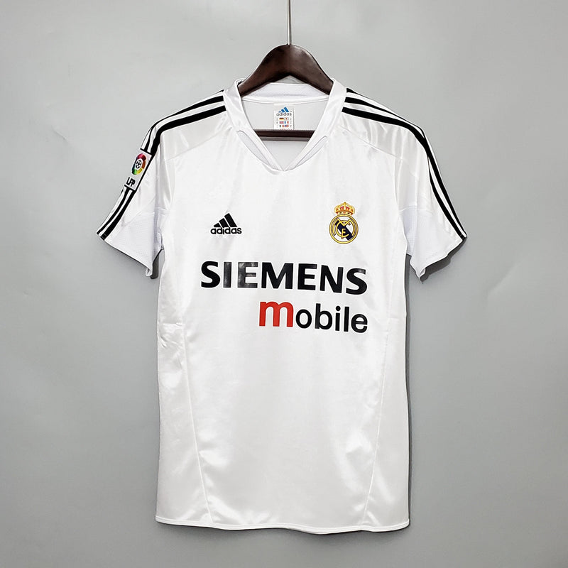 camisa-real-madrid-titular-I-2004-2005-adidas-manga-curta-lfp-la-liga-ronaldo-beckham-zidane-figo-branco-preto-cabide-fundo-branco-siemens-mobile