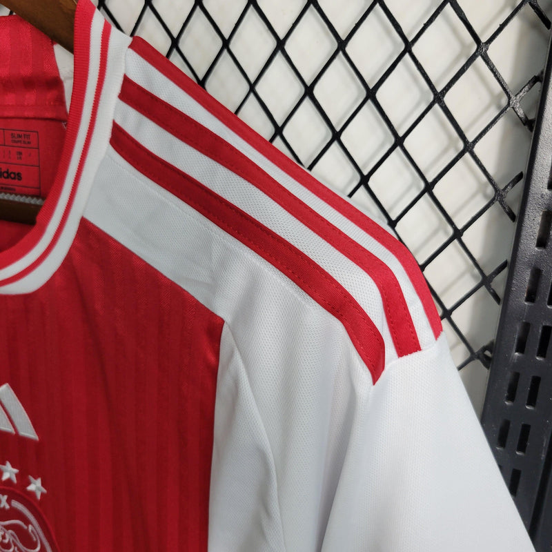 camisa-ajax-manto-ajax-home-vermelho-branco-adidas-23-24-torcedor-campeonato-alemao-ajax-Brian-Brobbey