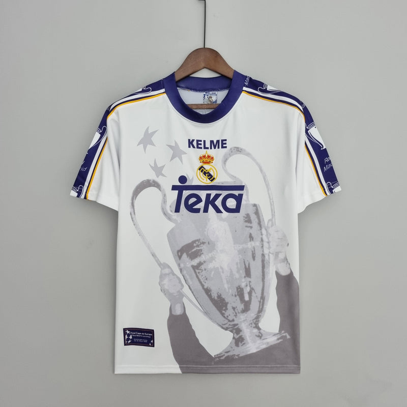 camisa-real-madrid-champions-7-branco-azul-dourado-teka-kelme-1997-1998-gola-redondo-roberto-carlos-seedorf-assinaturas-autógrafos