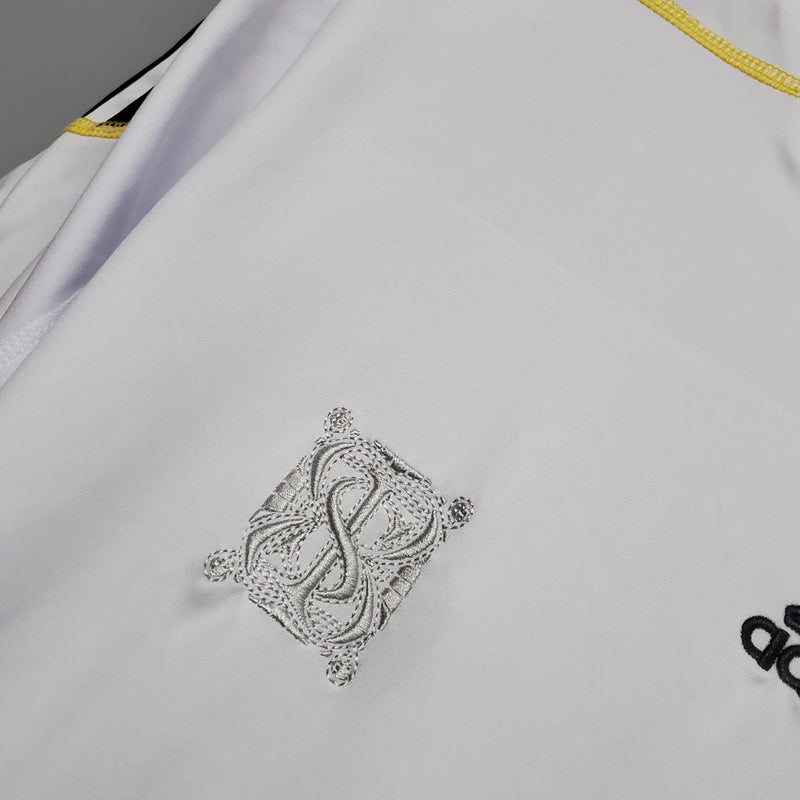 camisa-real-madrid-retrô-2009-2010-titular-I-manga-curta-gola-silk-bordado