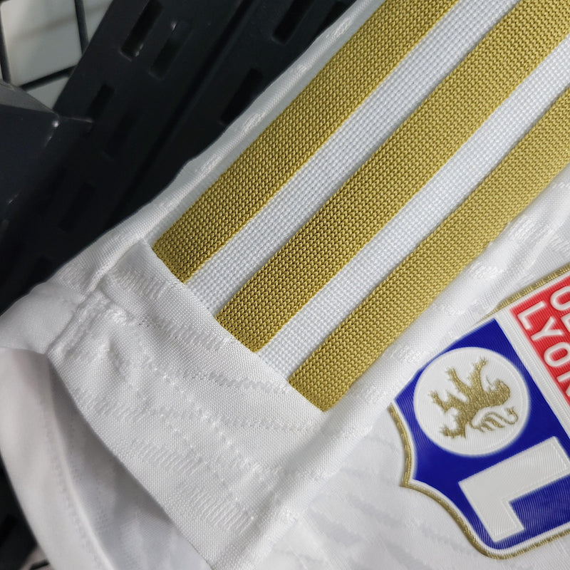 Shorts Lyon Home Adidas 2023/24 Branco e Dourado