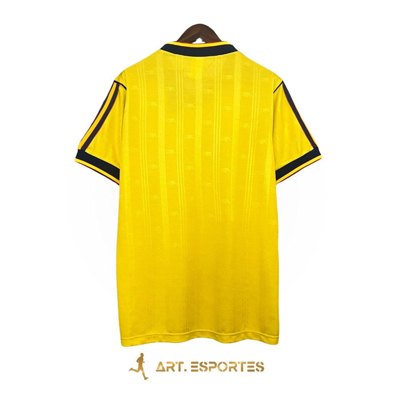 camisa-arsenal-away-II-reserva-86-88-amarelo-listras-brilhantes-cabide-fundo-branco-JVC-adidas-gunners-manga-curta-gola-v-uniforme-2