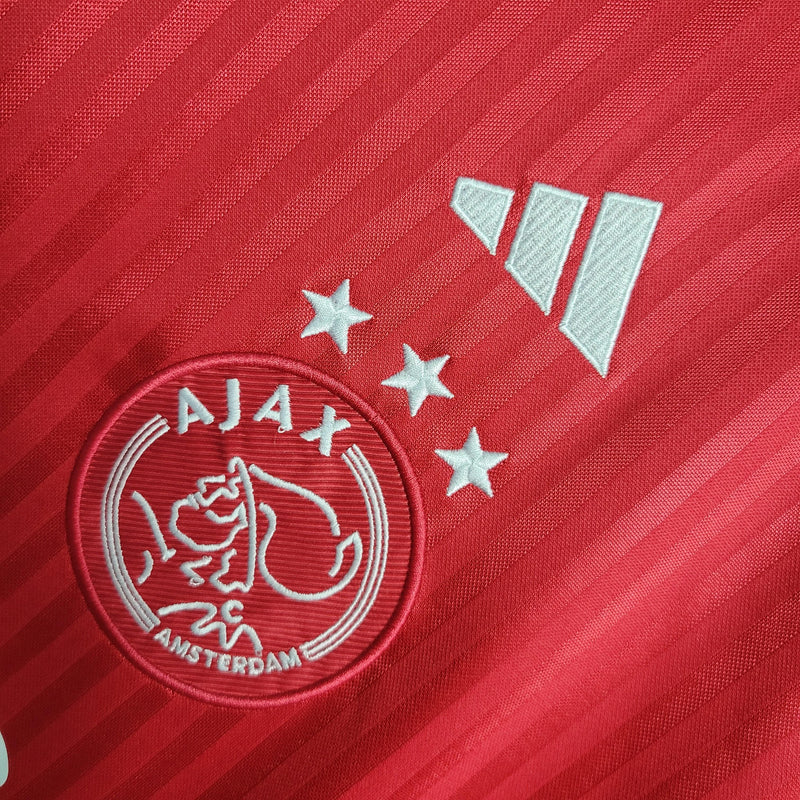 camisa-ajax-manto-ajax-home-vermelho-branco-adidas-23-24-torcedor-campeonato-alemao-ajax-Brian-Brobbey