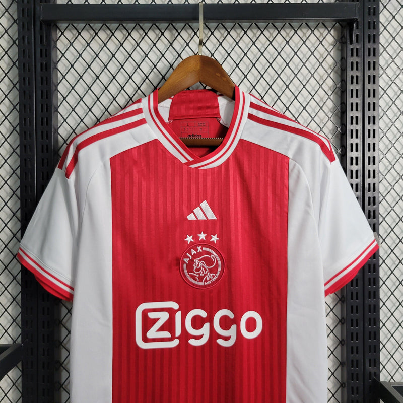 camisa-ajax-manto-ajax-home-vermelho-branco-adidas-23-24-torcedor-campeonato-alemao-ajax-Brian-Brobbey