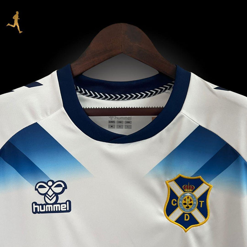 Camisa Tenerife I Home 24/25 - Versão Torcedor Branco, Azul - Hummel