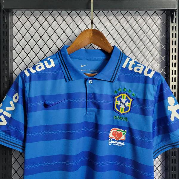 camisa-brasil-gola-polo-azul-gola-branca-botão-vivo-itau-guaraná