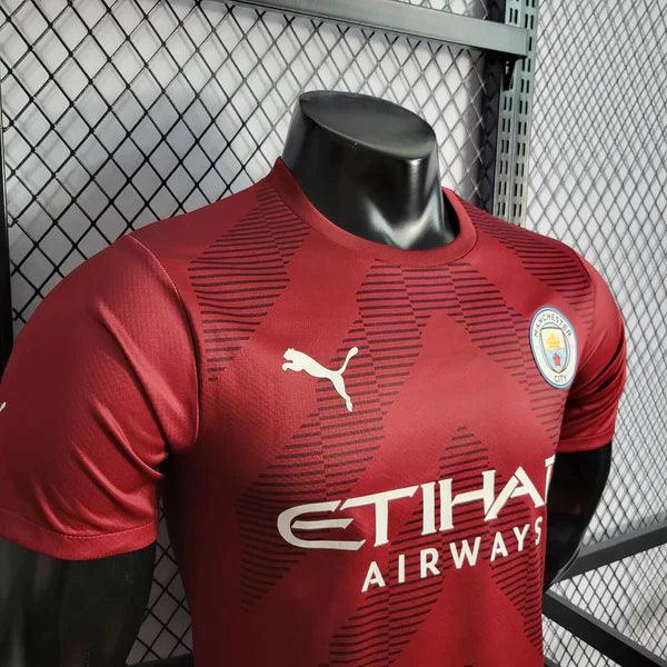 camisa-manchester-city-versao-jogador-vinho-22-23-vermelho-reserva-away