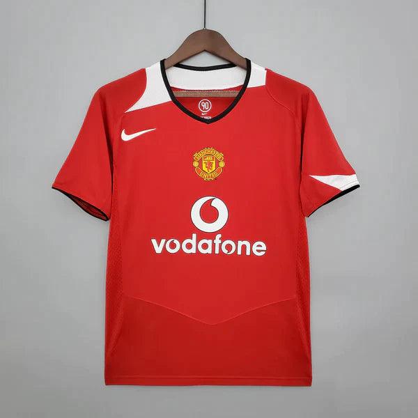 camisa-manchester-united-titular-I-2004-2006-vermelho-gola-preta-v-vodafone-bordado-branco