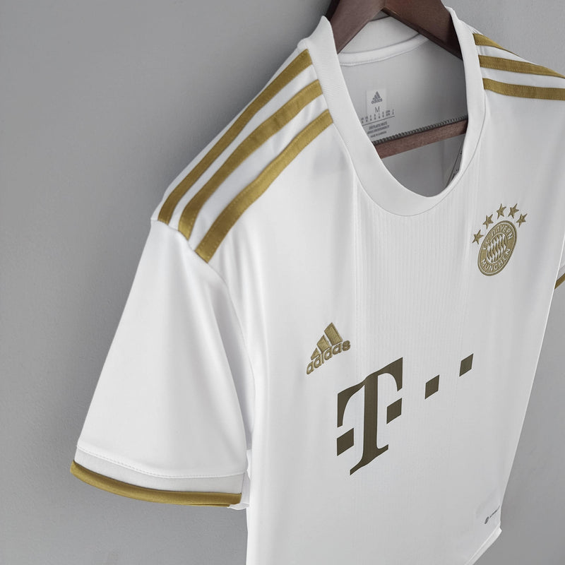 camisa-bayern-de-munique-away-ll-versão-torcedor-adidas-branco-dourado-23-24-harry-kane-thomas-muller-vidovic