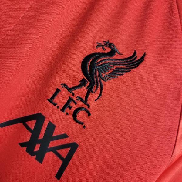 camisa-liverpool-vermelha-i-titular-home-gola-polo-preto-premiere-league-22-23
