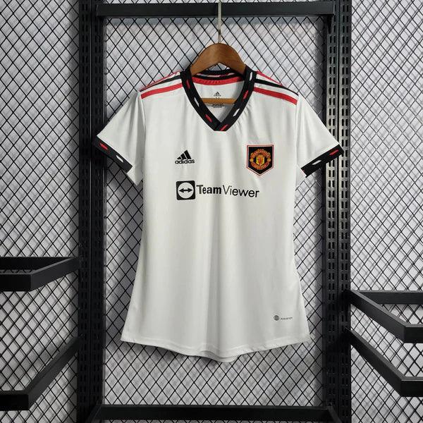 camisa-manchester-united-feminina-2023-2024-branca-gola-v-detalhada-vermelho-preto-adidas-grade-ao-fundo-away-reserva