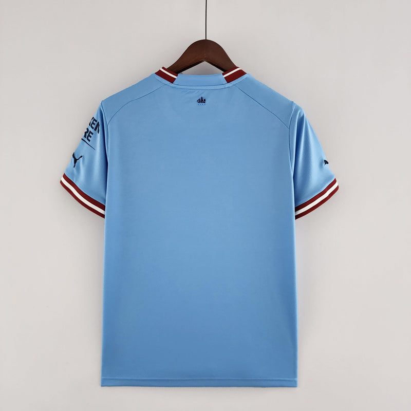 camisa-manchester-city-22-23-torcedor-home-titular-casa-erling-haaland-puma-azul-branco-grená