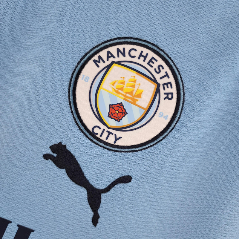 camisa-manchester-city-22-23-torcedor-home-titular-casa-erling-haaland-puma-azul-branco-grená