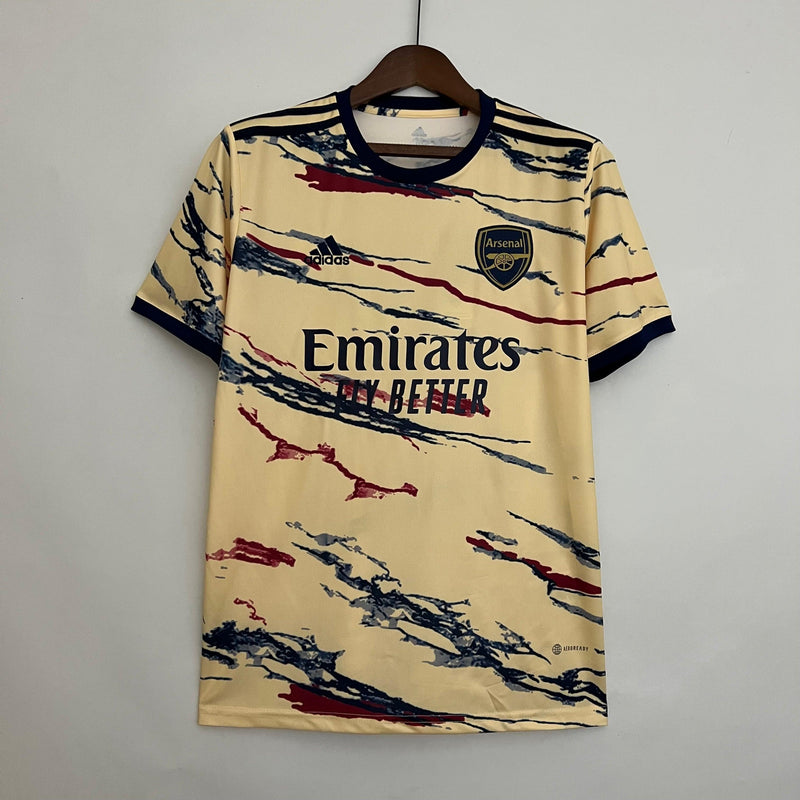 camisa-arsenal-concept-23-24-versão-torcedor-amarelo-bordado-gola-redonda-preta-fundo-branco-cabide