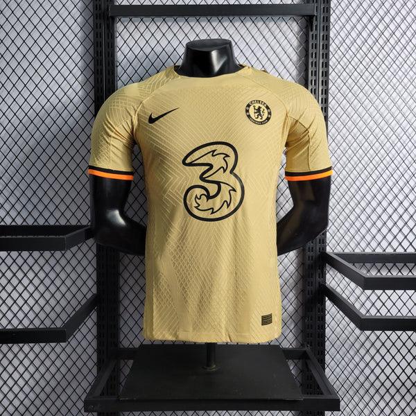 camisa-chelsea-3-reserva-22-23-versao-jogador-uniforme-third-laranja-bege-preto-manga-curta