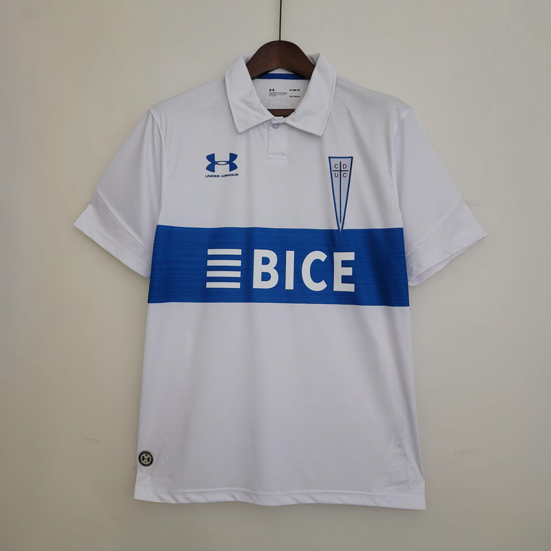 Camisa Universidade Católica UnderArmor Home - Versão Torcedor 23/24 Branca e Azul