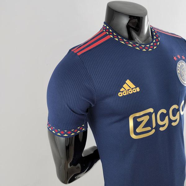 camisa-ajax-manto-ajax-away-ii-azul-amarelo-vermelho-adidas-22-23-torcedor-jogador-campeonato-alemao-ajax-Brian-Brobbey