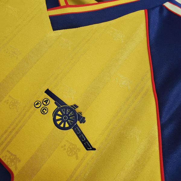 camisa-arsenal-retrô-1988-1989-amarelo-gola-v-manga-curta-azul-listras-amarelas-e-brilhantes-gunners-premiere-league