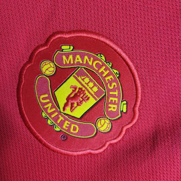 camisa-manchester-united-titular-1-home-2010-2011-vermelho-gola-polo-branca