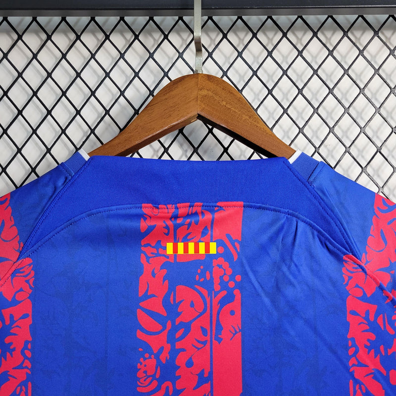 Camisa Barcelona Treino Nike - Versão Torcedor 23/24 Azul e Vermelho Spotify