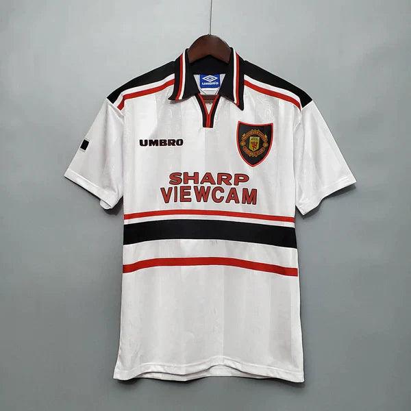 camisa-manchester-united-retrô-sharp-viewcam-gola-polo-preta-umbro-branca-1997-1998-reserva-II-cantona