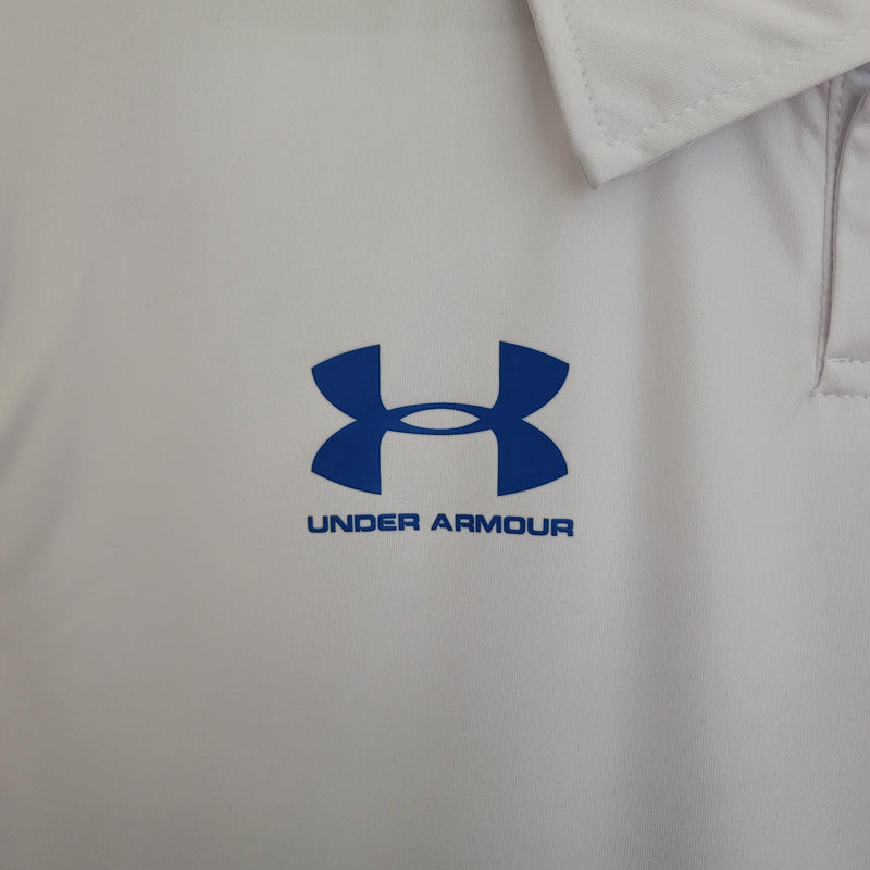 Camisa Universidade Católica UnderArmor Home - Versão Torcedor 23/24 Branca e Azul