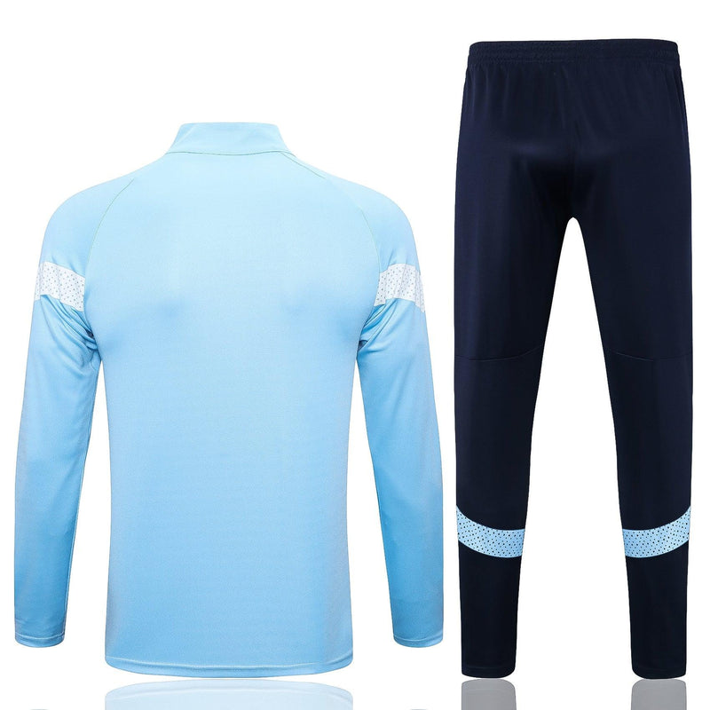 conjunto-manchester-city-titular-corta-vento-calça-azul-costas