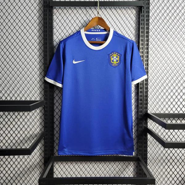 camisa-brasil-away-retrô-II-2006-reserva-azul-branco-ronaldo-ronaldinho-grade-ao-fundo