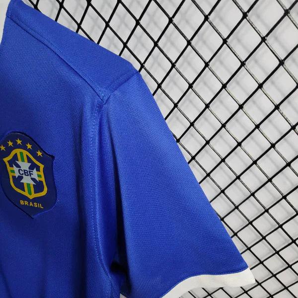 camisa-brasil-away-retrô-II-2006-reserva-azul-branco-ronaldo-ronaldinho-grade-ao-fundo