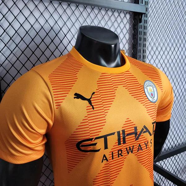 Camisa-Manchester-City-Goleiro-Versão-Jogador-Puma-2022/23-Laranja