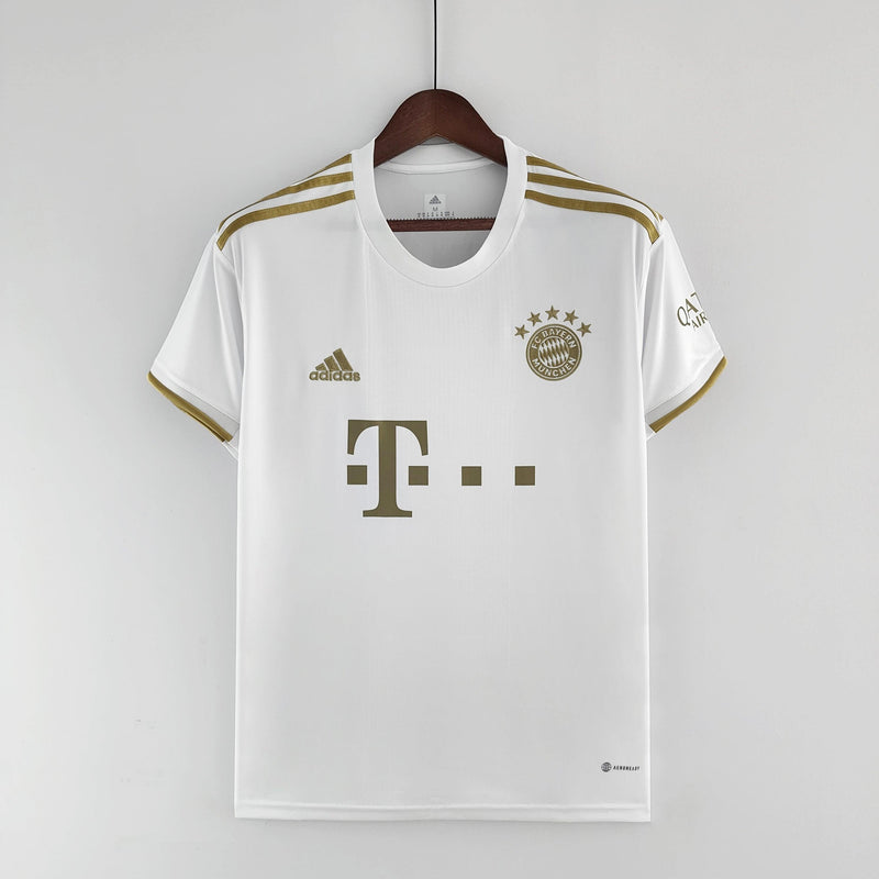 camisa-bayern-de-munique-away-ll-versão-torcedor-adidas-branco-dourado-23-24-harry-kane-thomas-muller-vidovic