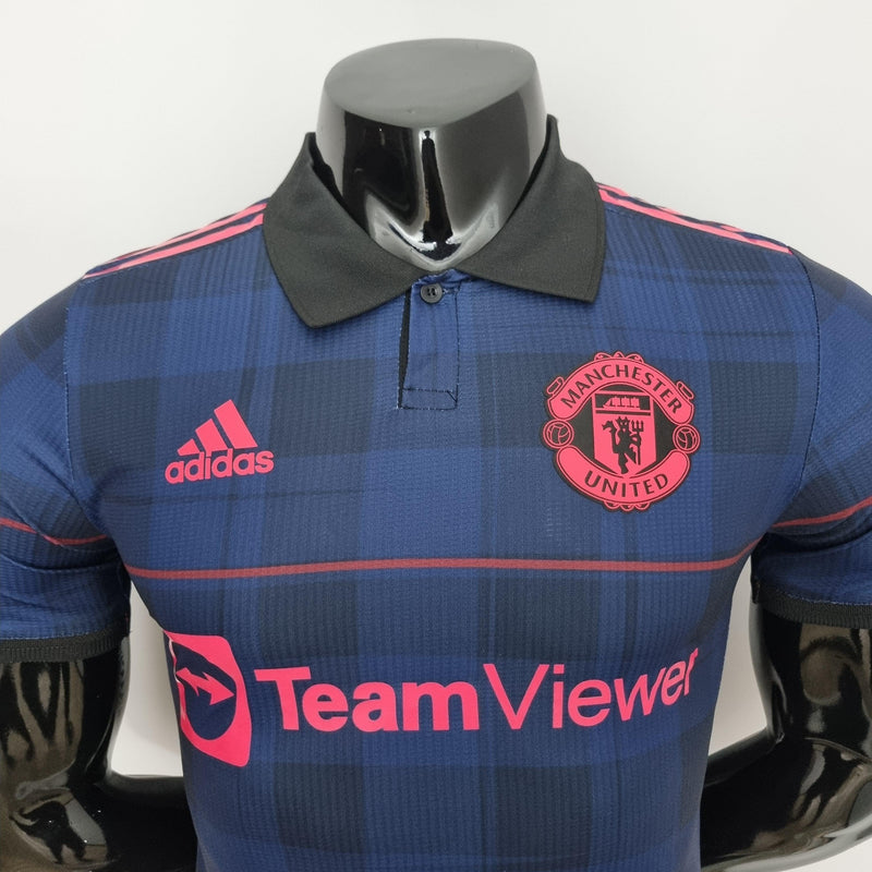 camisa-manchester-united-azul-royal-gola-polo-versão-jogador-silk