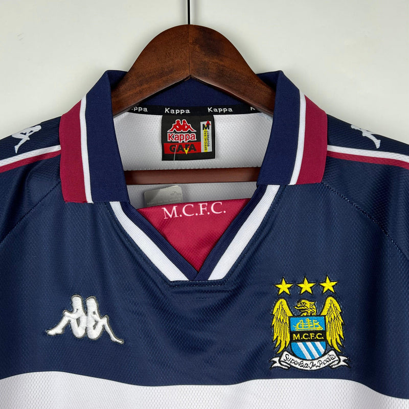 camisa-manchester-city-away-II-1997-1998-gola-polo-branco-azul-vermelho-retrô-cabide-fundo-branco-kappa