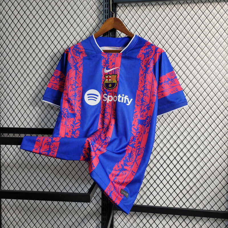 Camisa Barcelona Treino Nike - Versão Torcedor 23/24 Azul e Vermelho Spotify