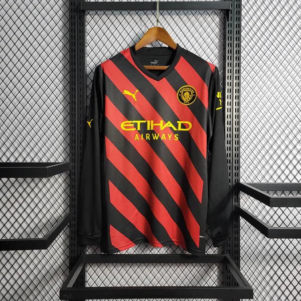 camisa-manchester-city-away-22-23-vermelho-preto-amarelo-gola-v