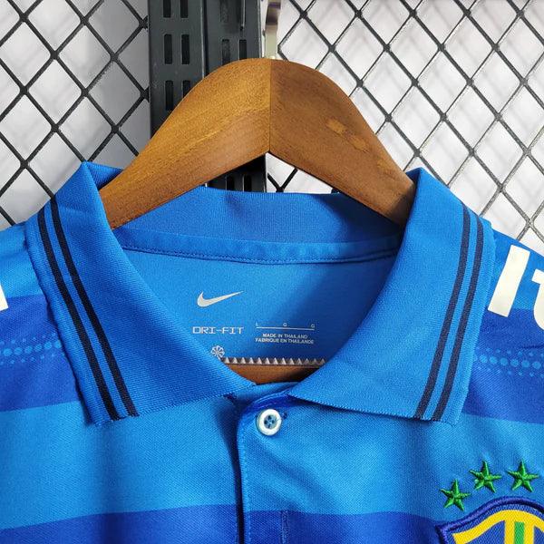 camisa-brasil-gola-polo-azul-gola-branca-botão-vivo-itau-guaraná