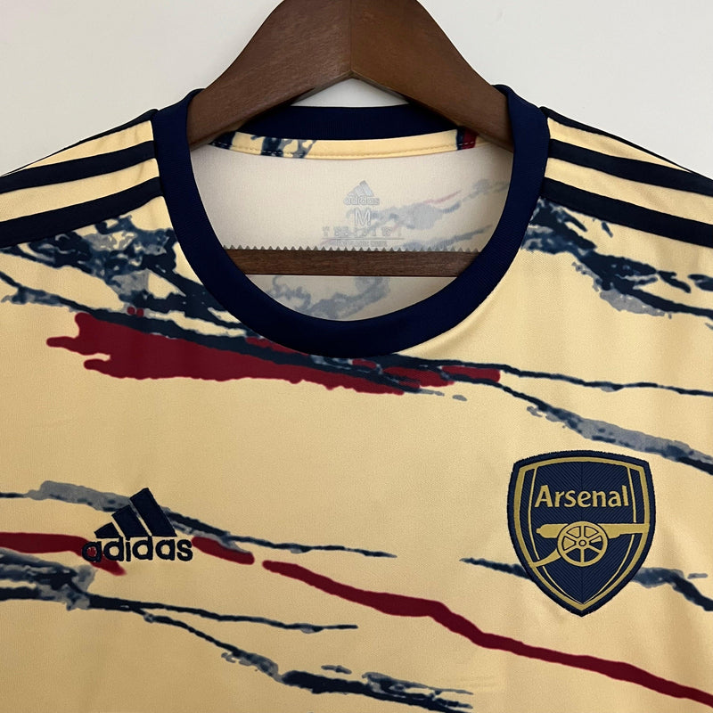 camisa-arsenal-concept-23-24-versão-torcedor-amarelo-bordado-gola-redonda-preta-fundo-branco-cabide