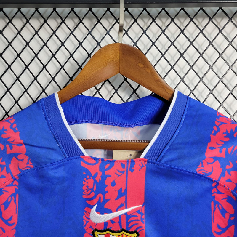 Camisa Barcelona Treino Nike - Versão Torcedor 23/24 Azul e Vermelho Spotify