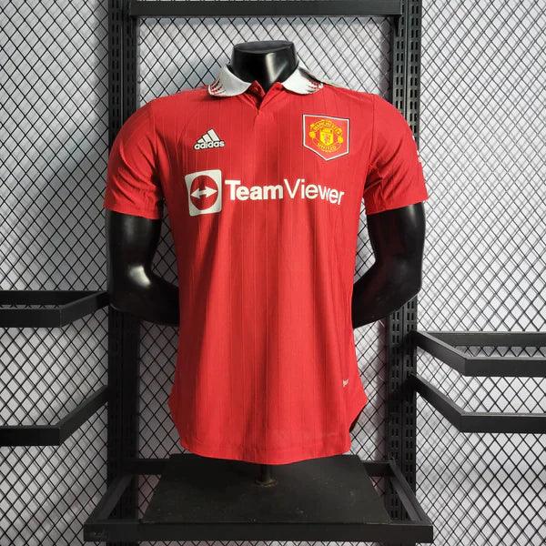 camisa-manchester-united-I-titular-versão-jogador-gola-polo-vermelho-branco-grade-fundo