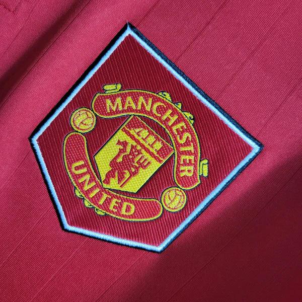 camisa-manchester-united-I-titular-home-22-23-versão-torcedor-manga-curta-gola-polo-vermelho-branco